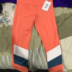 Zyia tangerine block leggings, light and tight, new with tags, size 6-8